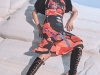Complete Look, Prada | Heat things up in an ensemble that’ll defy any storm: an eye-catching print, fiery hues and knee-high heels