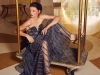 ALBERTA FERRETTI silver embroidered bustier, metallic grey pleated midi skirt & silver crystal earrings from CARA Boutique. JIMMY CHOO “Minny” multi hologram sandals from KULT