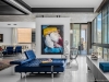 Earthy colours, textured walls, gunmetal finishes and grey marble flooring are combined with wood and cosier finishes to produce a more home-like feel.