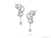 Graff’s earrings feature loose and free loops, topped off by a beautifully cut pear-shaped diamond