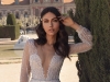 Innocence and seduction define this stunning and breathtaking trimmed-at-thewaist,pearl-encrusted bespoke bridal gown | Photo Courtesy of Julie Vino