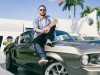 Brett David, CEO of Prestige Imports with his 1967 Ford Mustang GT500 Eleanor, parked infront of his waterfront home in Miami