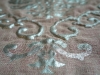 A snapshot of one of Pirbhai’s works in progress: a hand-painted motif on linen sheer using the trapunto technique / Photo by Geoff Fitzgerald
