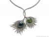 From the Peacock collection, the Río necklace in white gold, green tourmaline, iolite, blue sapphires, tsavorite garnets and diamonds mimics the movement of peacock feathers.  | Photos Courtesy Of Carrera Y Carrera Canada