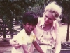Sash on a bike with his adoptive mother, Sandra Simpson | Photo Courtesy Of Sash Simpson