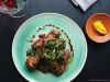 Besides her acclaimed creativity and imagination in bringing an international bounty of cuisines to life at Lola, Seidler’s determination to assist the vulnerable is her guiding passion | Photo Courtesy of Lola Restaurant
