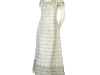 A Christian Dior Evening Gown of Silver-Encrusted Brocade: With matching Evening Bag, from 1968, was the top couture lot, realizing $362,500 in the Haute Couture Evening Sale. Elizabeth Taylor wore the dress to the annual ball hosted by Guy de Rothschild and his wife at their country home, Chateau de Ferrières, in Brie, France.