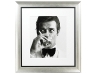 6. Black-and-white photo of Roger Moore