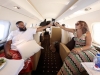First Class: Khaled celebrates life as he toasts with Mama Asahd, his wife Nicole Tuck, on a private jet