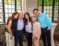 Harvey and Elise Kalles stand proudly and happily with children (left to right) Corinne, Shawna and Michael | Photo Courtesy Of Who’s Who In Luxury Real Estate