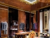 32 Latin inscriptions are featured throughout the boutique with marble and polished brass letters inset into the stone mosaic floor | Photo by Antoine Huot