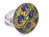 A magnetic meadow of gems and diamonds unite in this 18-karat white gold dazzler