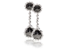 Standing tall and dignified, these white gold earrings with four rose-cut black diamonds add ear-catching glamour for a night on the town.