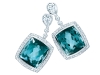 The diamond drop earring steps outside the box with dazzling blue tourmaline and a platinum backdrop.