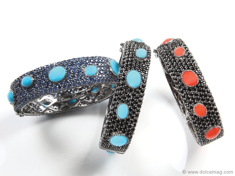 The Cuff Bangle, offered in pavé London blue topaz with turquoise cabochons or black onyx and coral cabochons, adds casual elegance for a signature look.