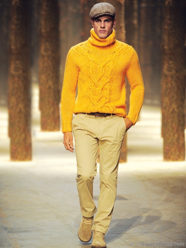 Refined and unforgettable, Corneliani’s style is handsome yet relaxed. This stunning yellow sweater and paperboy hat are perfect for any time of day.