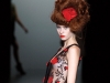 Blushing rosebuds adorn this sheer embroidered black dress from Elisa Palomino’s Eternal collection.