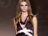 Cinched with a bow, this black and white deep-V Roberto Verino dress will impress at any affair.