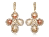 rmth with Sutra’s 18-karat yellow gold natural rough diamond earrings.
