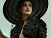 Look 1: Beaded black bolero, paired with flower cut-out pants, is accentuated by a dramatic Scarlett O’Hara hat / Pants: Amen Couture,  Cropped Jacket: IH NOM UH NIT, Hat: Gladys Tamez Millinery | Photography by Thomas Louvagny