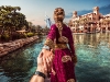 The Burj Al Arab Jumeirah looks on in the distance as Nataly leads Murad through the vibrant city of Dubai