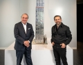 Mitchell Cohen of Westdale Properties (left) and Paolo Ferrari of Studio Paolo Ferrari (right) stand beside a model of the 73-storey East Tower | Photo By Emad Mohammadi