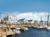 an artists rendering of friday harbours bustling marina