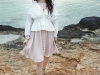 Feel buoyant in a combination of rose-pink and crisp white, accented by the ever-feminine frills and cinches / Dress, Marc Cain; Shirt, Sonia by Sonia Rykiel; Shoes, Jimmy Choo