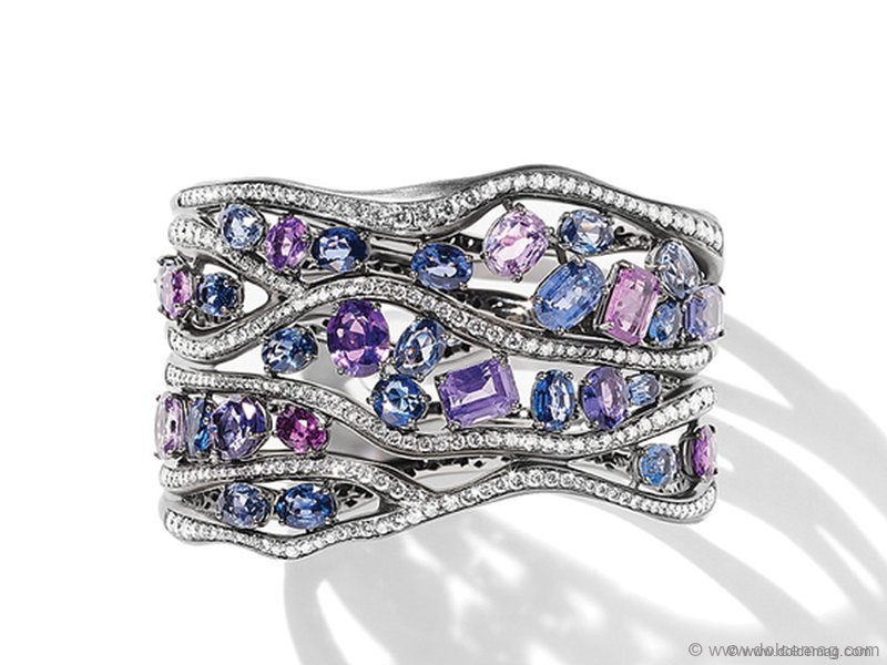 Unexpected lines and spring-hued jewels synchronize stunningly with diamonds in this unique bangle www.antonini.it Retailer - Holt Renfrew