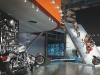 A varied collection of bikes flies off a large ramp at one of the museum’s many exhibits.