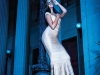 Outshine the moon in a curve-hugging bandage gown that blurs the line between sultry and sexy / Gown, Hervé Léger; Necklace, L George Designs