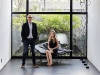 Principal architect Enrico Daffonchio and project architect Frances Joynt enjoy the powerful space of this Johannesburg home. Wallace Chaise Lounge by Jean-Marie Massaud for Poliform; Ipsilon stool by Rodrigo Torres for Poliform; Parentesi lights by Achille and Pier Giacamo Castiglioni for Flos