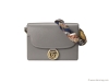For those in search of a little fl air, Gucci’s Medium Leather Shoulder Bag features a shoulder strap with a multicoloured scarf