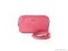 Prada’s Saffi ano Mini Crossbody Bag is a lovely pink satchel sure to offer plenty of storage space while making a statement.