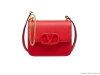 Valentino’s Small Garavani Vsling bag is made from decadent calfskin and features a bold colour to match its signature design
