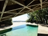 The living room offers a breathtaking view of Goldstein’s custom-designed rooftop infinity pool | Photo by Derek Swalwell