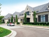 Above, the pictured JTF Homes build features a gorgeous exterior of Indiana cut limestone and a slate roof, with windows and doors trimmed with Indiana rubble coursing | Photos Courtesy Of JTF Homes