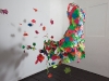 A disintegrating dress made of neon leaves for a window  display at Union Jewellery. Photography: Ivan Jones.