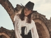 Blouse, Dolce & Gabbana; Pants, Elie Saab; Belt, Alberta Ferretti; Hat, Maison Michel; Bag, Dolce & Gabbana; Shoes, Gucci