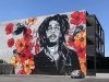 1. The “sun is shining, the weather is sweet” by American artist David Flores, on La Molina Street, gives off an urban vibe.