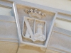 The design for the Guglietti’s hand-carved, limestone crest was the result of archival research in Italy.