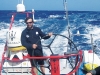 Sailing since he was a kid, skipper Giovanni Soldini takes the helm while watch leader Brad Van Liew acts as lookout.