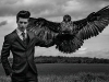 model in suit with bird