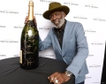 Richard Roundtree of Moving On and Michelle Monaghan of Nanny were just two of several stars to autograph a Moët & Chandon bottle to be auctioned off to raise funds to support the cause | Photo Courtesy Of TIFF