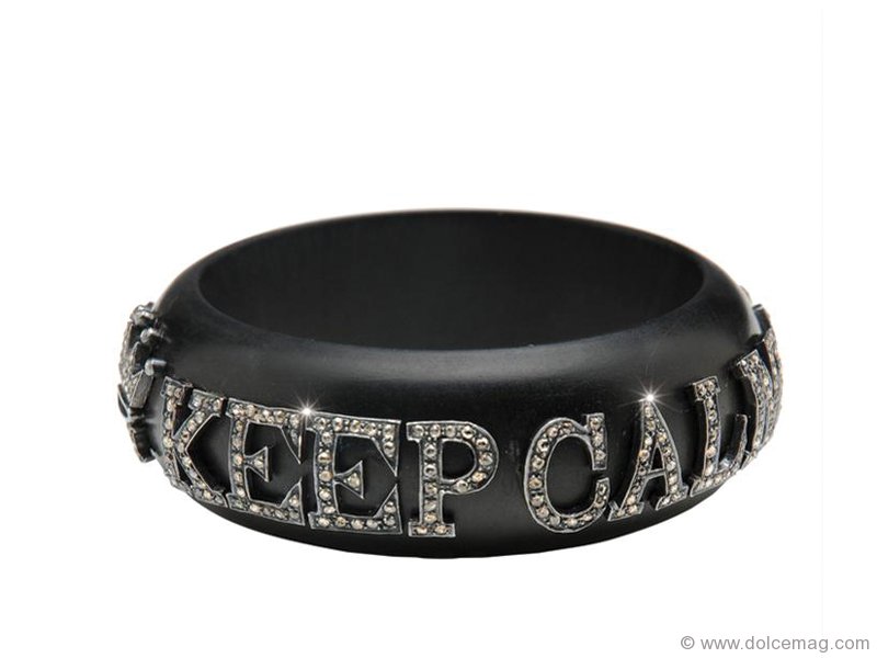 If you’re looking for motivation, look to your wrist for inspiration. With the diamond-encrusted words “Keep Calm and Carry on” strewn across the ebony cuff of this sparkling bangle, you’ll find the strength to get through anything.