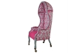 A unique twist on vintage furniture, this hot pink chair comes upholstered with patterned fabric that demands to be seen.
