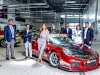 Giancarlo, Fortune, Lina, Francesco, Aurora and Francesco Policaro, the next generation of the Policaro Automotive Family, stand in the service garage of Porsche Centre Oakville next to their family’s race car, which won a race in the Ultra 94 Porsche GT3 Cup Challenge Canada by Michelin at the 2015 Honda Indy