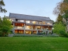 Librach uses generous stone and wood in a sleek, modern and contemporary approach to design | Photo by Studio Shai Gil