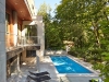 Librach uses generous stone and wood in a sleek, modern and contemporary approach to design | Photo by Studio Shai Gil