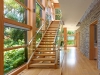 Librach uses generous stone and wood in a sleek, modern and contemporary approach to design | Photo by Studio Shai Gil